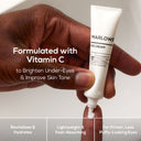 Marlowe vitamin C eye cream in a sleek jar, designed for reducing puffiness and brightening the delicate skin around the eyes.