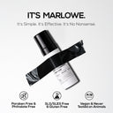 MARLOWE gentle foaming facial cleanser in a clear bottle, showing the soft foam texture ready for skincare use.